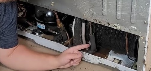 Cleaning the condenser coils of a Dacor refrigerator