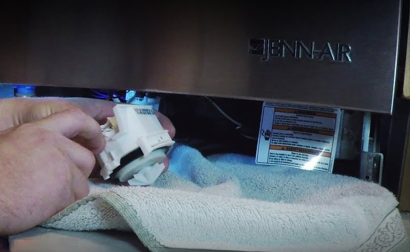 Cleaning the drain hose of a Jennair dishwasher