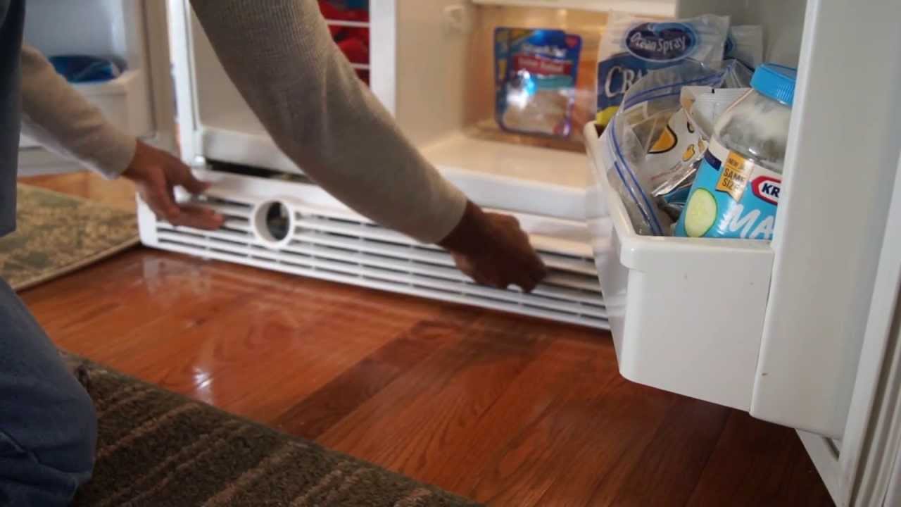 Cleaning the condenser coils of a Kenmore refrigerator