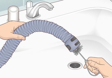 Cleaning the drain hose of a Kirkland dishwasher