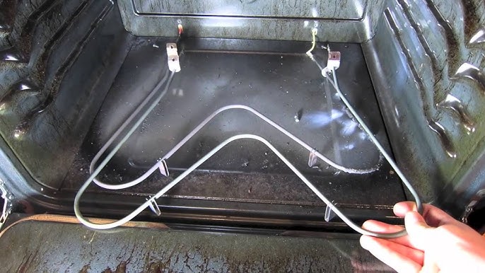 Inspecting the heating elements of an oven